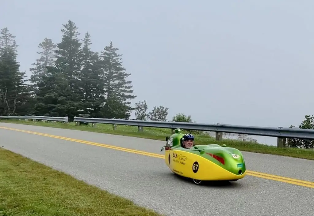 Sleek bülk mk 1 velomobile gliding on the street
